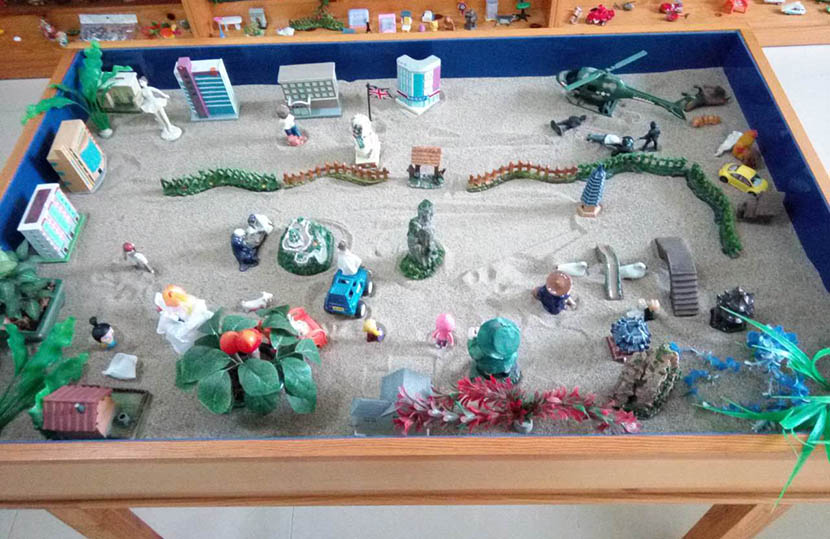 A sand table with toys, used for psychotherapy at Yancheng Prison, Hebei province, Sept. 22, 2016. Li Lubao for Sixth Tone