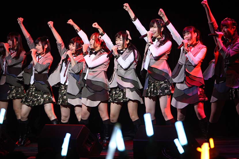 Members of SNH48 perform during the ‘Give Me More’ concert in Shanghai, Jan. 12, 2013. VCG