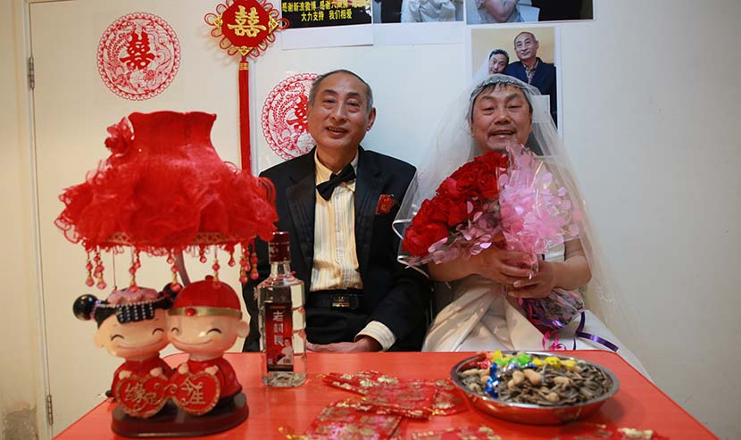 Two older men hold a symbolic wedding ceremony in Beijing, Jan. 30, 2013. ChinaFotoPress/VCG