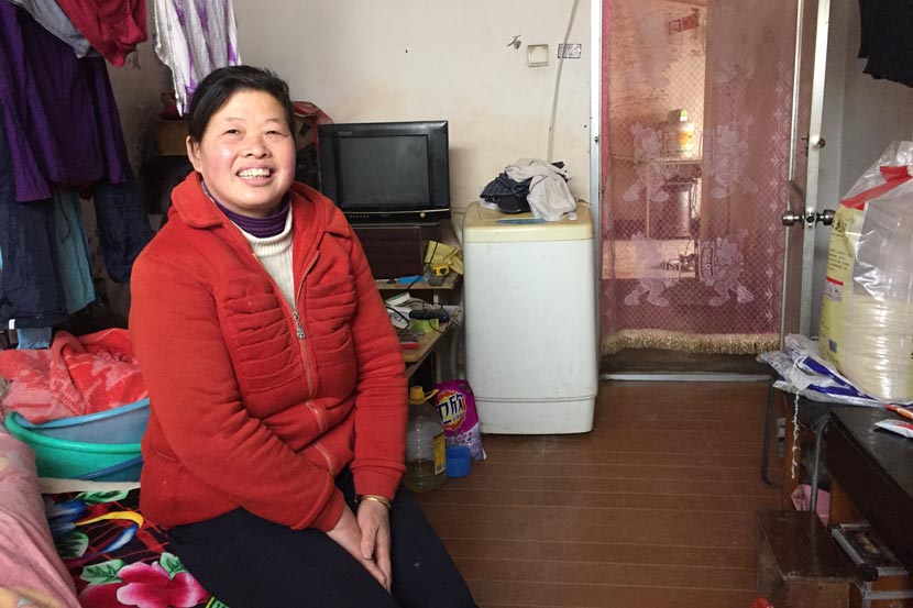 Cheng Jinhua sits at home in Pi Village, Beijing, Dec. 30, 2016. Fu Danni/Sixth Tone