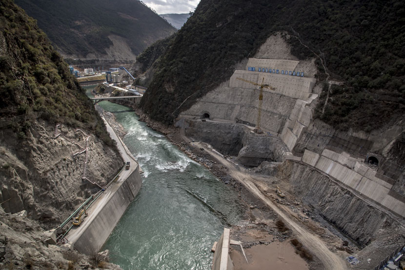 A hydropower dam owned by state-owned Sinohydro company is one of many construction projects underway along the Mekong River, Jinglin, Yunnan province, Feb. 15, 2016. Luc Forsyth for Sixth Tone