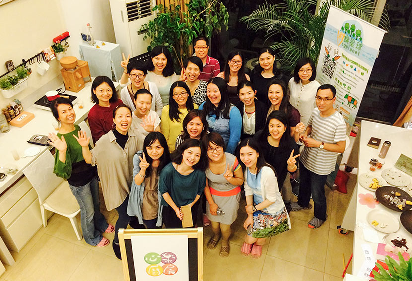 Participants pose for a photo at an event held by Veg Planet in Shanghai, May 15, 2015. Courtesy of Zhang Si