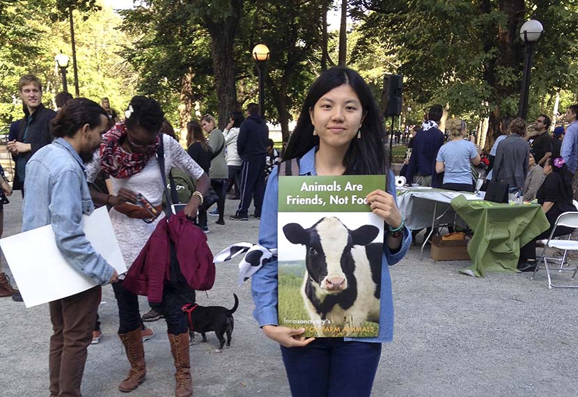 Zhang Si poses for a photo while volunteering at the annual Walk for Farm Animals in New York, Oct. 18, 2014. Courtesy of Zhang Si