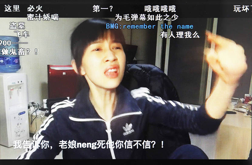 A screenshot of Papi Jiang gesturing demonstratively in one of her video clips. commander/IC
