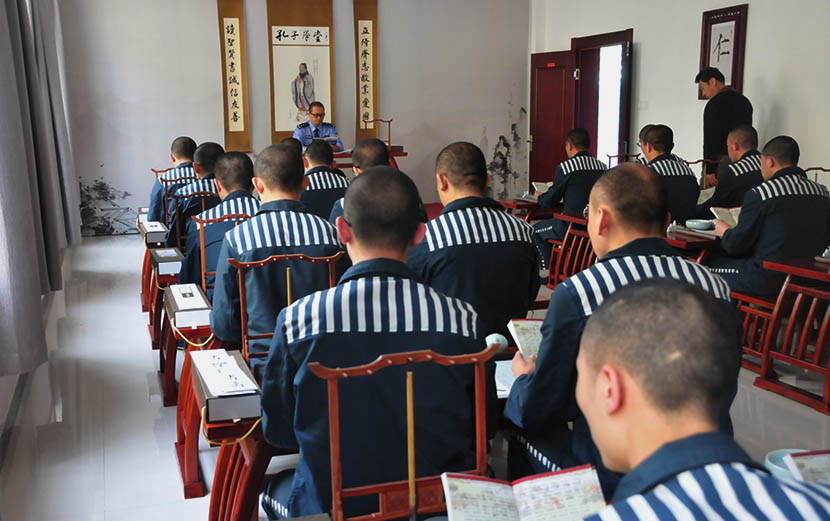 Prisoners study the teachings of Confucius at the Confucius School at Luzhong Prison, Zibo, Shandong province, May 7, 2016. Douyacai/VCG