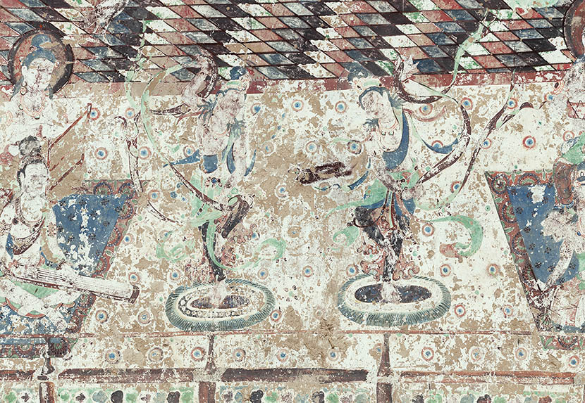 A mural in Cave 220 depicts dancing bodhisattvas, Dunhuang, Gansu province. Courtesy of the Dunhuang Academy