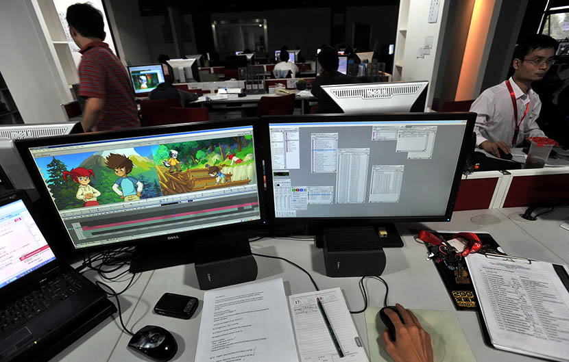 An animator works on a cartoon project in Wuhan, Hubei province, Oct. 10, 2009. The company made 13 million euros in 2008, but nearly 70 percent came from outsourcing jobs. Zhou Chao/EPA/IC