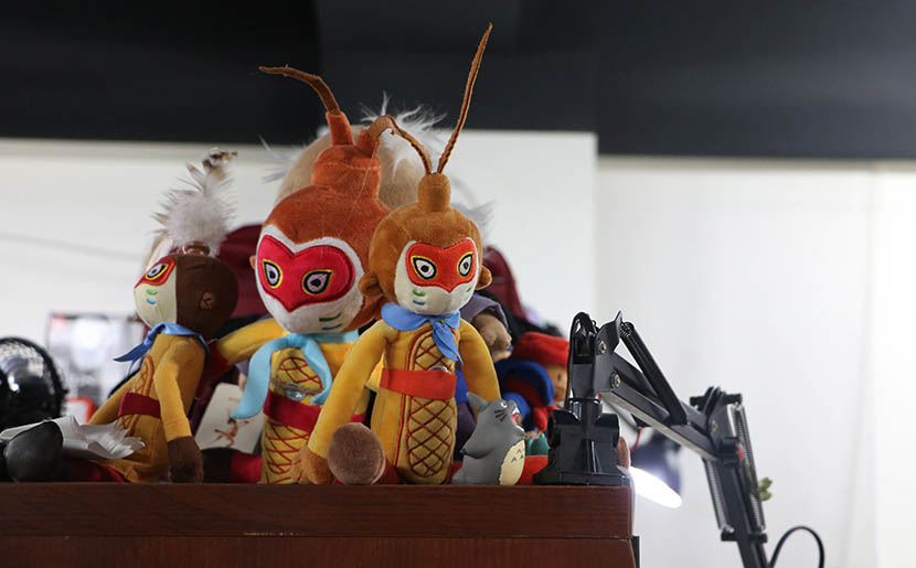 Dolls for the film ‘Monkey King: Hero Is Back’ sit on a desktop at the Thundray animation studio, Shanghai, July 27, 2016. Yin Yijun/Sixth Tone