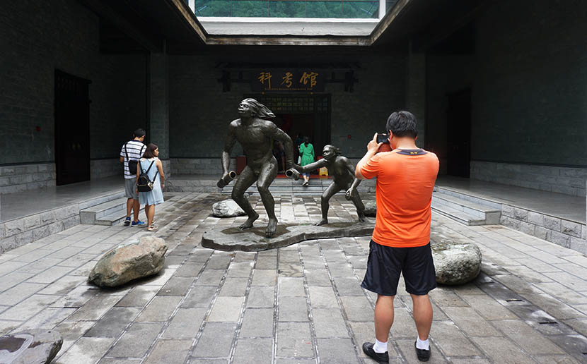 A Bigfoot statue stands in front of the natural history museum in Shennongjia, Hubei province, Aug. 3, 2016. Feng Jiayun/Sixth Tone