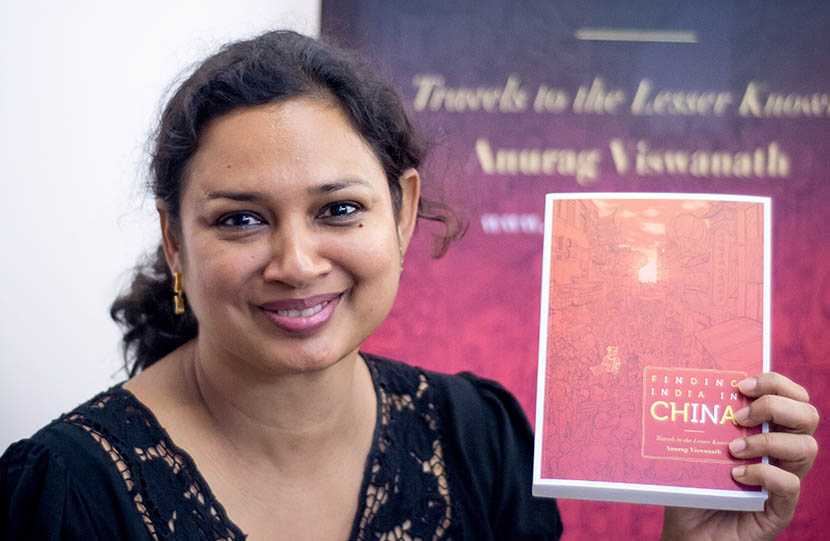 Anurag Viswanath holding her book ‘Finding India in China’ at a promotional event, Dec. 9, 2015. Courtesy of Anurag Viswanath