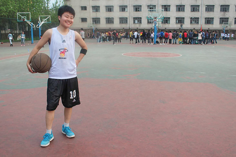 Meng Yu poses for a photo on the basketball court in Wuhan, Hubei province, 2012. Courtesy of Meng Yu