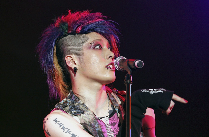 Japanese rock musician Miyavi performs during a music festival in Incheon, South Korea, July 28, 2006. Chung Sung-Jun/Getty Images/VCG