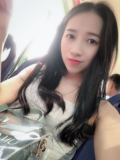 Ye Xiuyan takes a selfie on a bus in Haikou, Hainan province, 2018. Courtesy of Ye Xiuyan
