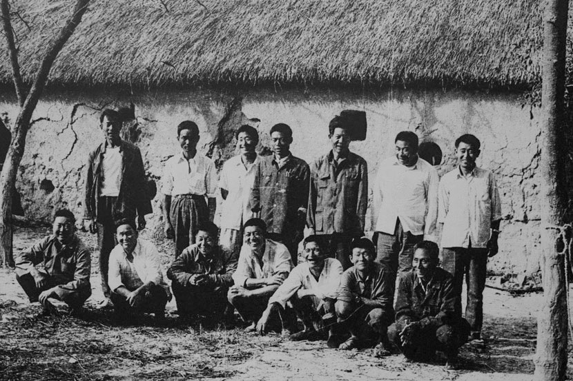 An archive photo depicts a number of men who pioneered the farming reform in Xiaogang during the late 1970s. Courtesy of Yan Hongchang