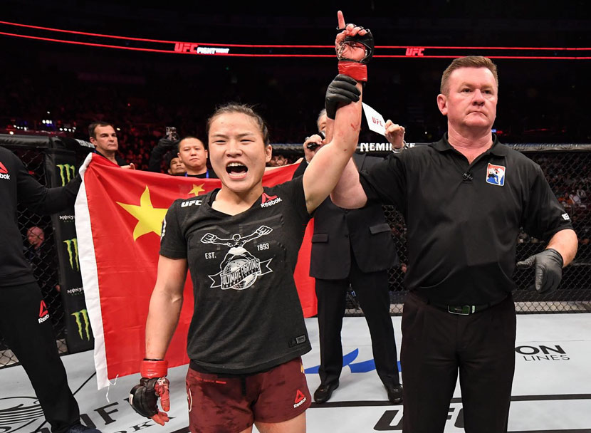 Chinese mixed martial artist Zhang Weili celebrates after her victory at UFC’s first-ever event in Beijing, Nov. 24, 2018. Courtesy of UFC