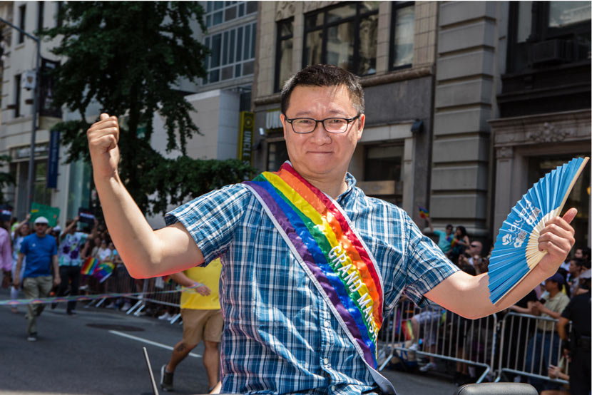 Ma Baoli, founder of Blued’s parent company, poses for a photo during a Pride march in New York, June 25, 2017. Ed Lefkowicz/VW Pics/IC