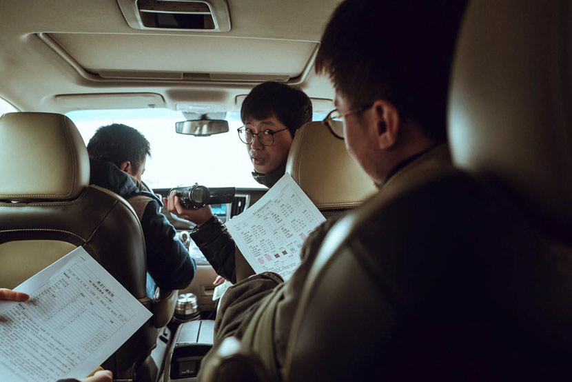Zheng Hongbin (center) during the three trucks’ tour in Nanjing, Jiangsu province, Jan. 14, 2019 Courtesy of Zheng Hongbin