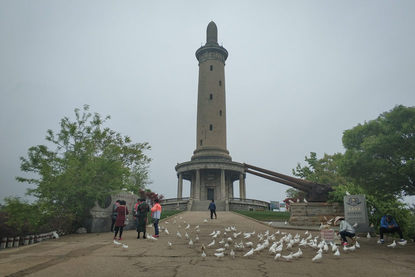 Tourists visit Baiyu Tower in Lüshun, Liaoning province, May 17, 2018. Courtesy of Ma Te