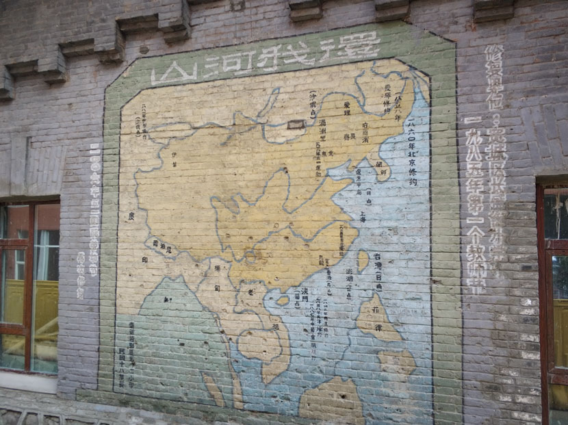 The 1929 mural “Give the Mountains and Rivers Back to Me,” which depicts the fraught geopolitics of the period, can still be seen on the walls of a Russian-built military camp in Changchun, Jilin province, May 27, 2018. Courtesy of Ma Te