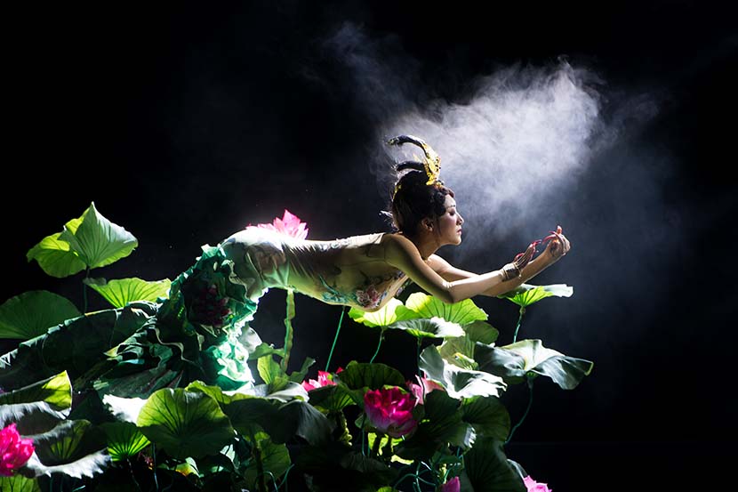 A dancer performs during the 5th Chengjiang Nuo Opera Cultural Festival in Yuxi, Henan province, May 9, 2019. Hu Chao/Xinhua