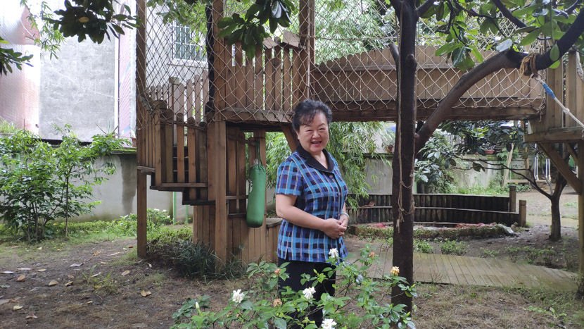 Founder Xue Mei poses for a photo in the garden of Xiyanghong, Guiyang, Guizhou province, June 17, 2019. Fan Yiying/Sixth Tone