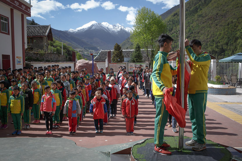 Students attend a flag-raising ceremony at the Garze Tibetan Autonomous Prefecture Special Education School in Yulin Township, Kangding, Sichuan province, May 8, 2017. Zhou Pinglang/Sixth Tone