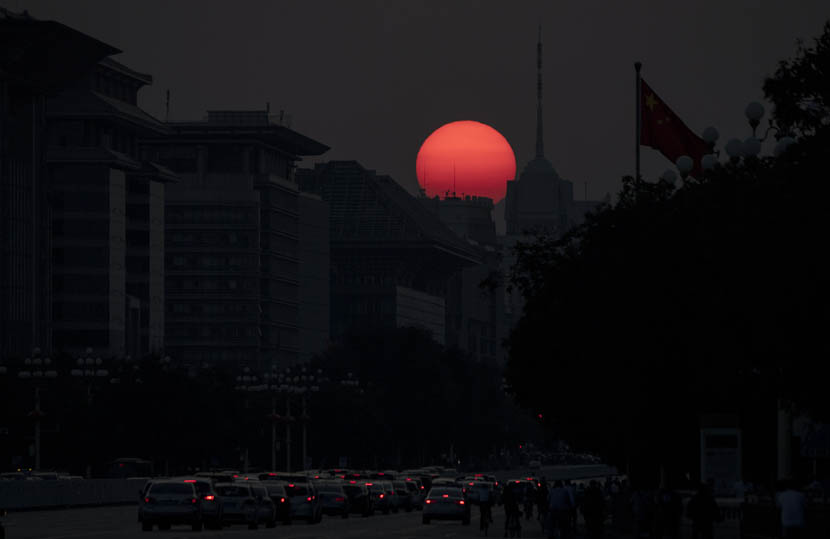 The sun sets on Beijing, Sept. 27, 2019. Noel Celis/ AFP/Getty Images/VCG