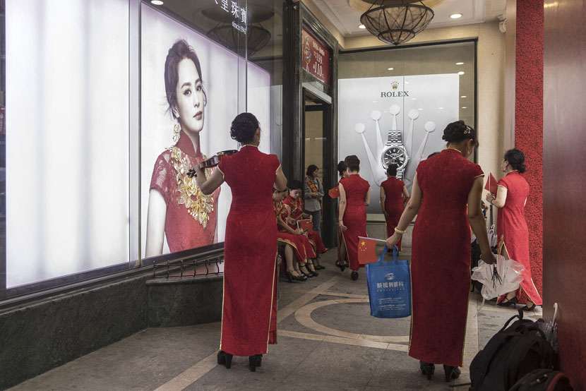 Performers gather in a hallway in Shanghai, Oct. 1, 2019. Qilai Shen/Bloomberg/VCG
