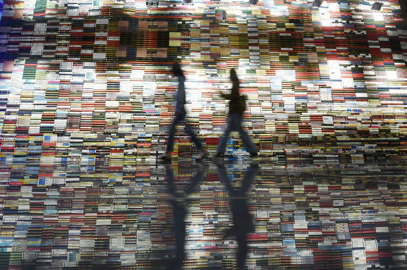 Shoppers walk through a book store in Hangzhou, Zhejiang province, Oct. 10, 2019. Long Wei/VCG