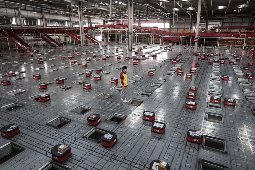 Robots sort packages at a warehouse owned by e-commerce firm JD.com in Wuhan, Hubei province, Nov. 5, 2019. VCG