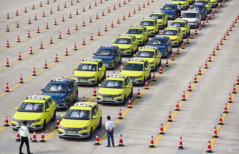 Taxis wait outside the National Exhibition and Convention Center during the 2nd China International Import Expo (CIIE), Shanghai, Nov. 6, 2019. Mai Tian/VCG