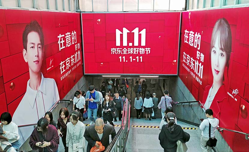 Billboards for Chinese e-commerce company JD.com are displayed at a subway station ahead of Singles’ Day in Shanghai, Oct. 25, 2019. VCG