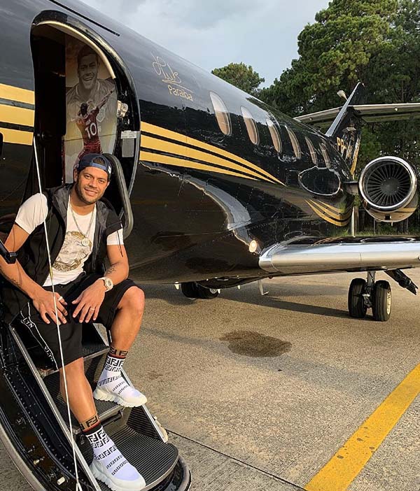 Brazilian soccer star Hulk poses with his private jet, which he purchased while earning tens of millions of dollars a year playing in China. From @hulkparaiba on Instagram