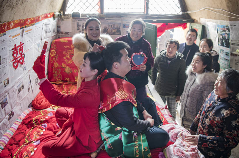 A traditional wedding ceremony is held in Zhidan County, Shaanxi province, Dec. 18, 2019. Tao Ming/Xinhua