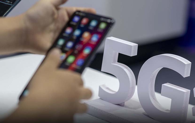 5G mobile phones are displayed at a telecom exhibition in Guangzhou, Guangdong province, June 25, 2019. IC