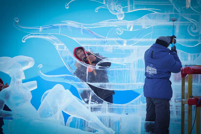 Artists prepare for an ice sculpture competition in Harbin, Heilongjiang province, Jan. 2, 2020. Wang Song/Xinhua