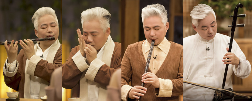 Fang Jinlong plays different instruments during a TV show. From @邻家诗话 on Weibo