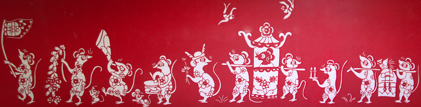 A paper-cut produced in 2013 tells the story behind “The Rat Daughter’s Marriage” festival. Tuchong