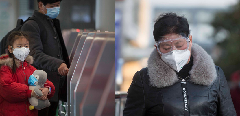 Passengers wearing face masks enter Shanghai Railway Station in Shanghai, Jan. 31, 2020. Yi Chuan for Sixth Tone