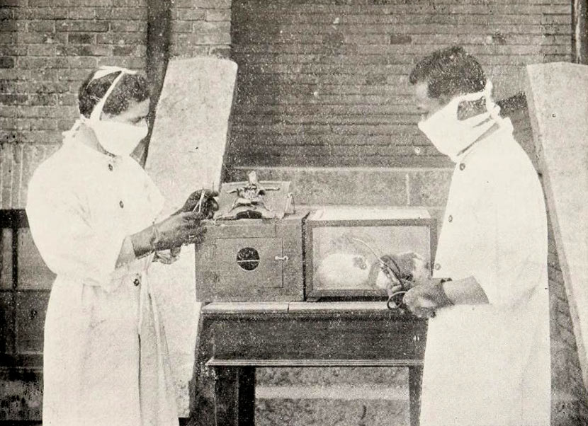 Dr. Wu Lien-teh (right) and F. Eberson perform plague inhalation experiments in Mukden, modern-day Shenyang, Liaoning province, 1916. From CRASSH/University of Cambridge