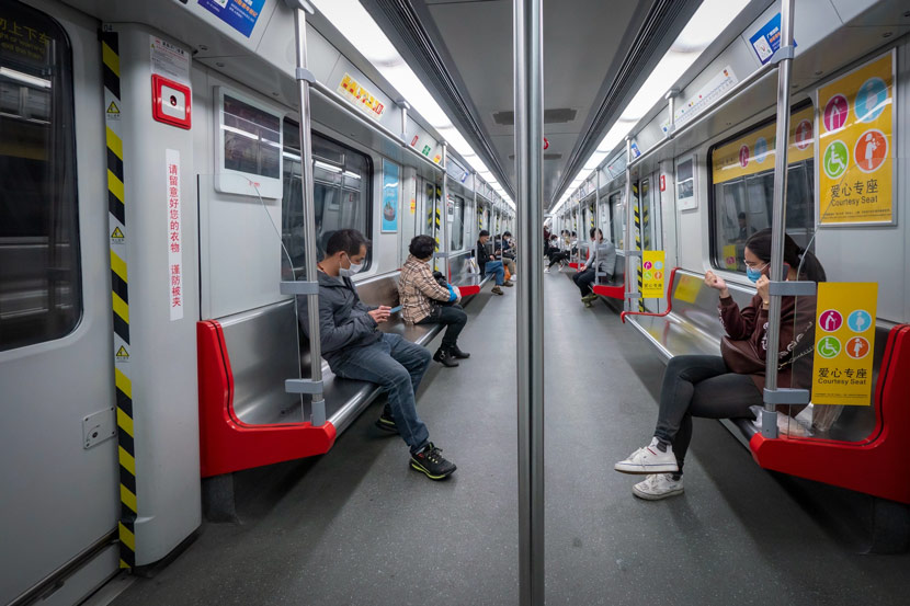 People take the subway in Guangzhou, Guangdong province, Feb. 23, 2020. Li Zhihao/IC
