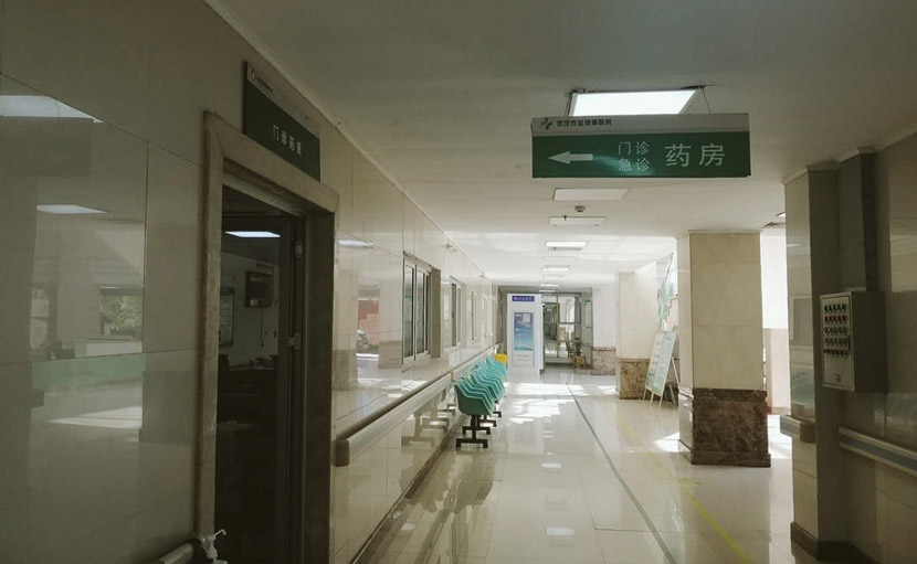 A view of a corridor near the pharmacy where volunteers collect anti-HIV medicine at Jinyintan Hospital in Wuhan, Hubei province, Feb. 20, 2020. Courtesy of MJ