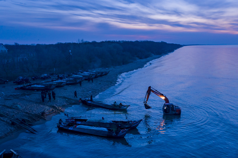 Fishers prepare for the new fishing season at Lake Khanka on the border between China and Russia in Baiyuwan Town, Heilongjiang province, April 25, 2020. Sun Changshan/IC