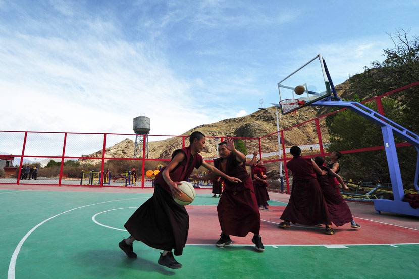 Monks play basketball at a monastery in Gonggar County, Tibet Autonomous Region, May 8, 2020. Zhang Wei/CNS/People Visual