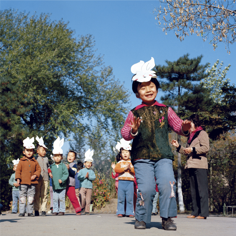 Children do a “bunny race” in Harbin, Heilongjiang province, 1981-1982. Courtesy of Ryoji Akiyama via Seisodo