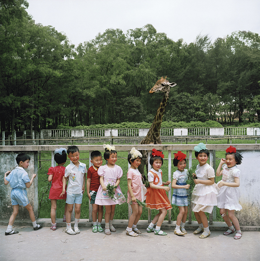 Children pose for a photo at a zoo in Guangzhou, Guangdong province, 1981-1982. Courtesy of Ryoji Akiyama via Seisodo