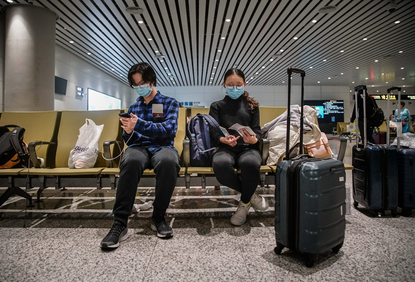 Overseas students returning from the U.S. arrive at an airport in Guangzhou, Guangdong province, March 26, 2020. Zheng Yijian/Southern Visual/People Visual