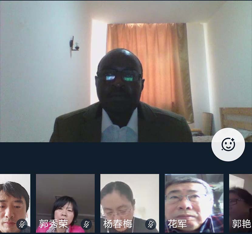 A student enrolled at Northeast Forestry University defends his thesis via video call from his home in Sudan, March 20, 2020. Xinhua