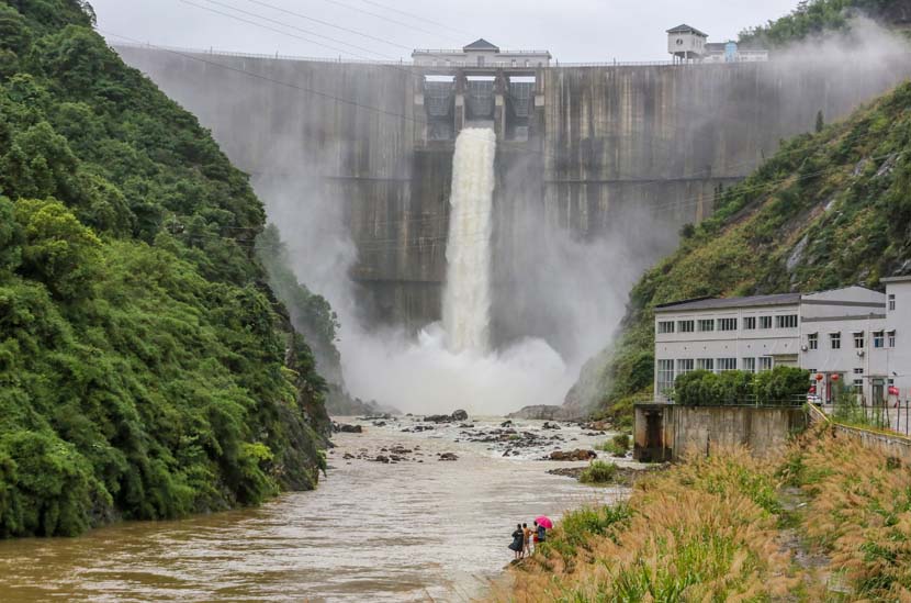 A reservoir discharges floodwater at Wugong Mountain in Pingxiang, Jiangxi province, June 26, 2020. People Visual