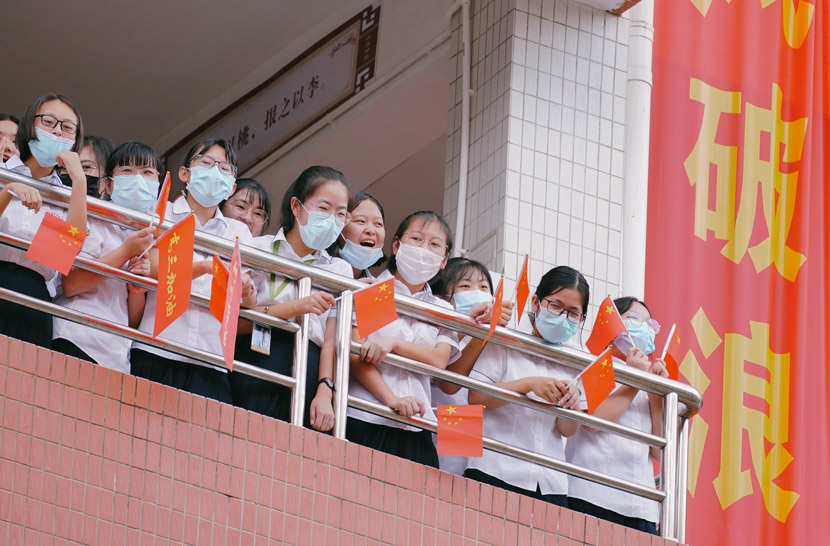 Students take part in a motivational activity ahead of the “gaokao” at a high school in Huizhou, Guangdong province, June 22, 2020. Zhou Nan/People Visual